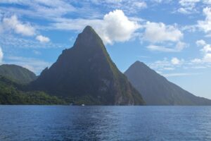 a breathtaking view of the iconic twin volcanic peaks rising above the lush landscape