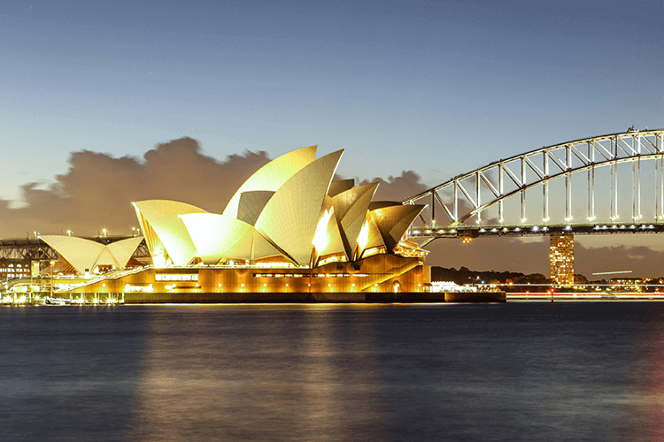 An elegant bridge gracefully arching over a tranquil body of water, offering a scenic passage