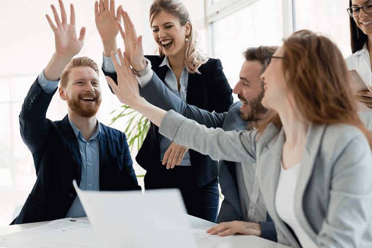 A group of people in a successful meeting