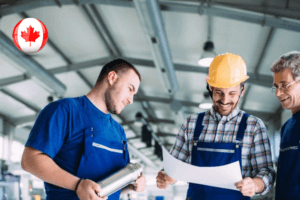 Canadian manufacturing jobs: Skilled workers operating machinery in a factory, contributing to the country's industrial growth