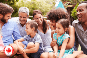 A family sitting on the grass, Enjoying a peaceful day outdoors