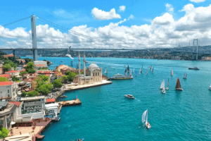 A scenic view of boats sailing near a picturesque bridge, creating a serene and captivating scene
