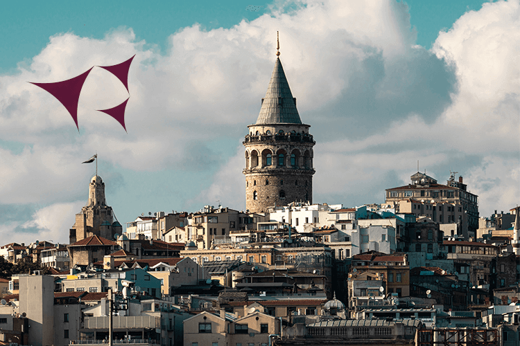 A cityscape with a towering structure and a vibrant