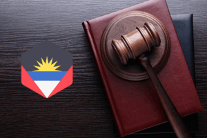 A logo of an Antigua and Barbados law firm, featuring a balance scale symbolizing justice and a gavel symbolizing legal authority