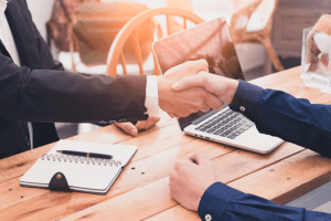 Shaking hands with investors