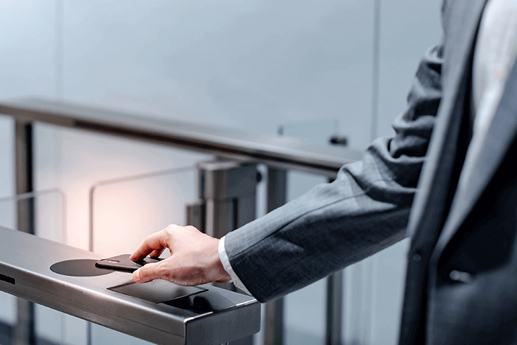 Men with suit his scanning a barcode